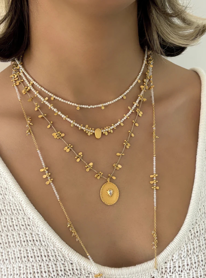 Long Moonstone gold charm necklace